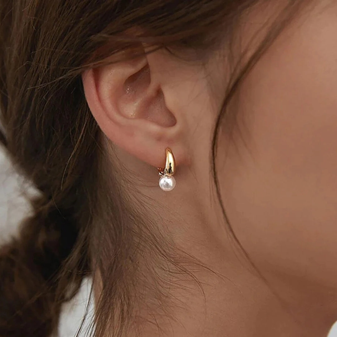 Unique – aretes con perlas en tono plateado